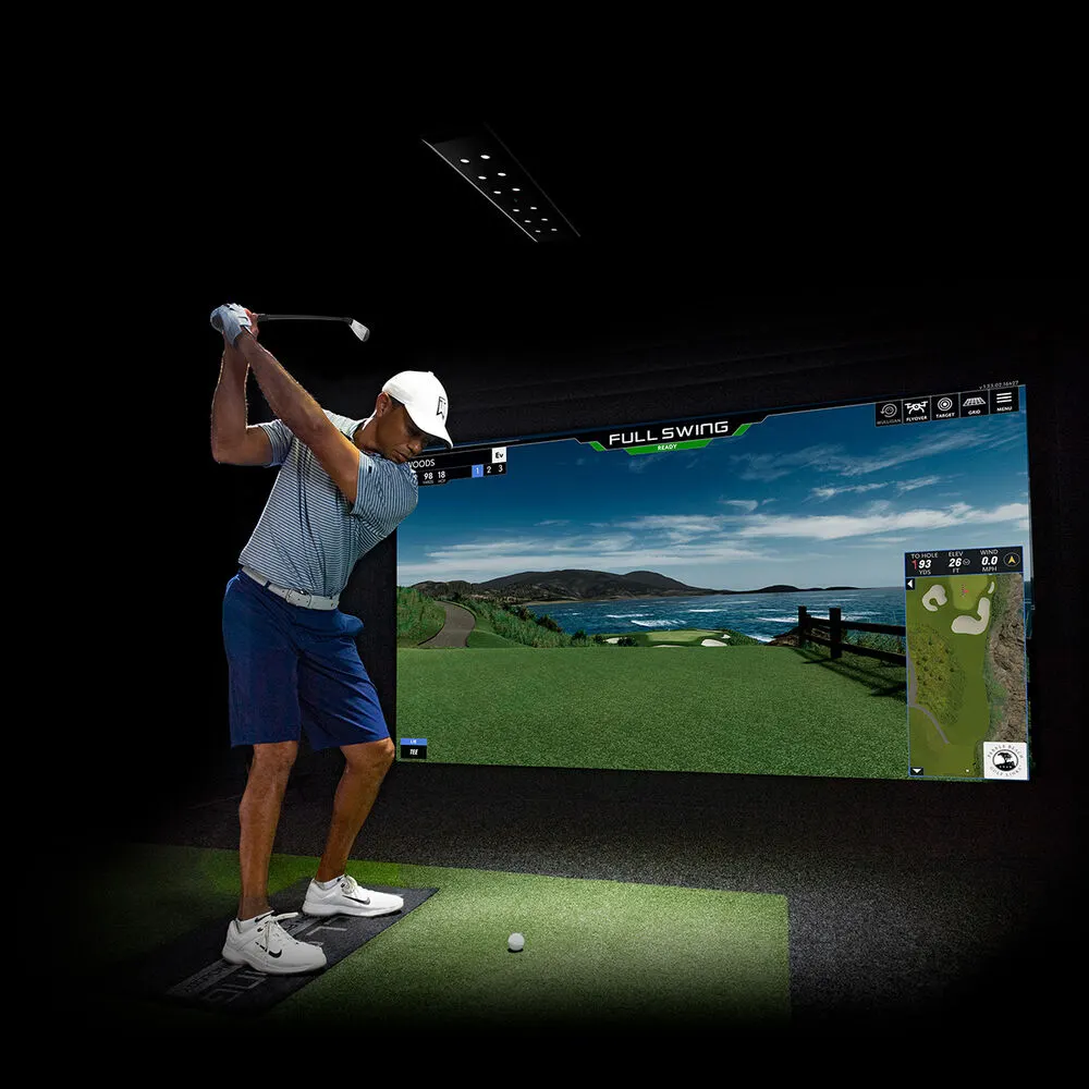 Tiger Woods hitting a shot on a Full Swing golf simulator